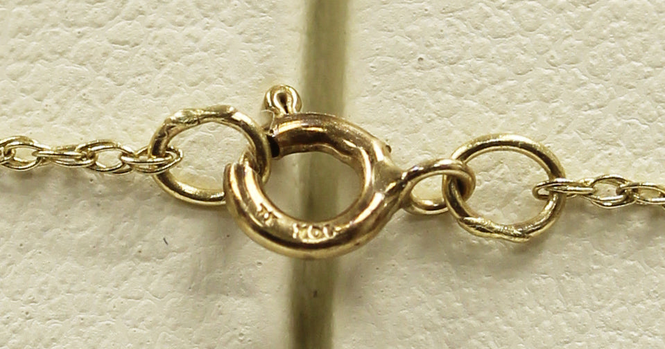 Gold & diamond spiral necklace 18 KT