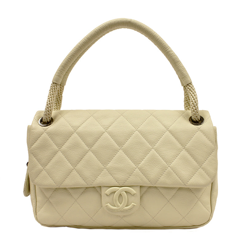 Chanel Cream Caviar Leather Flap Bag with Rope Handle.