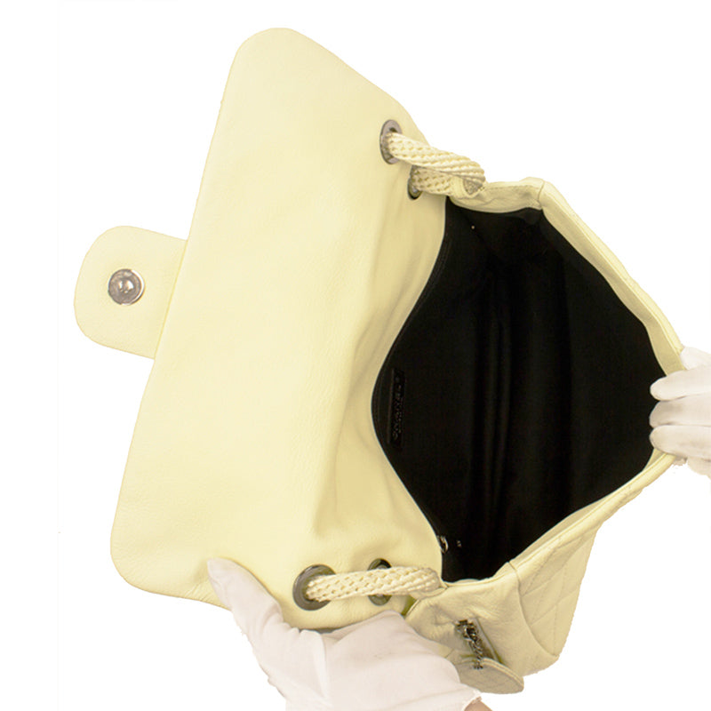 Chanel Cream Caviar Leather Flap Bag with Rope Handle.