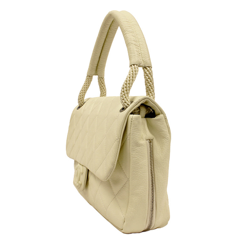 Chanel Cream Caviar Leather Flap Bag with Rope Handle.