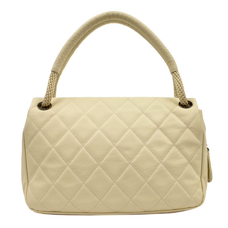 Chanel Cream Caviar Leather Flap Bag with Rope Handle.