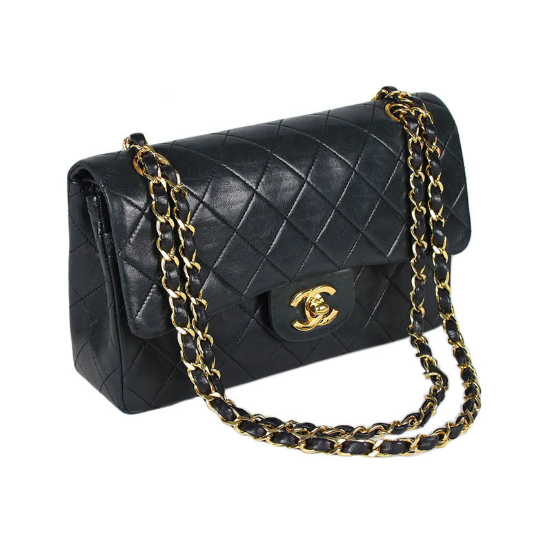 Chanel small classic navy double flap with gold tone hardware and double chain.