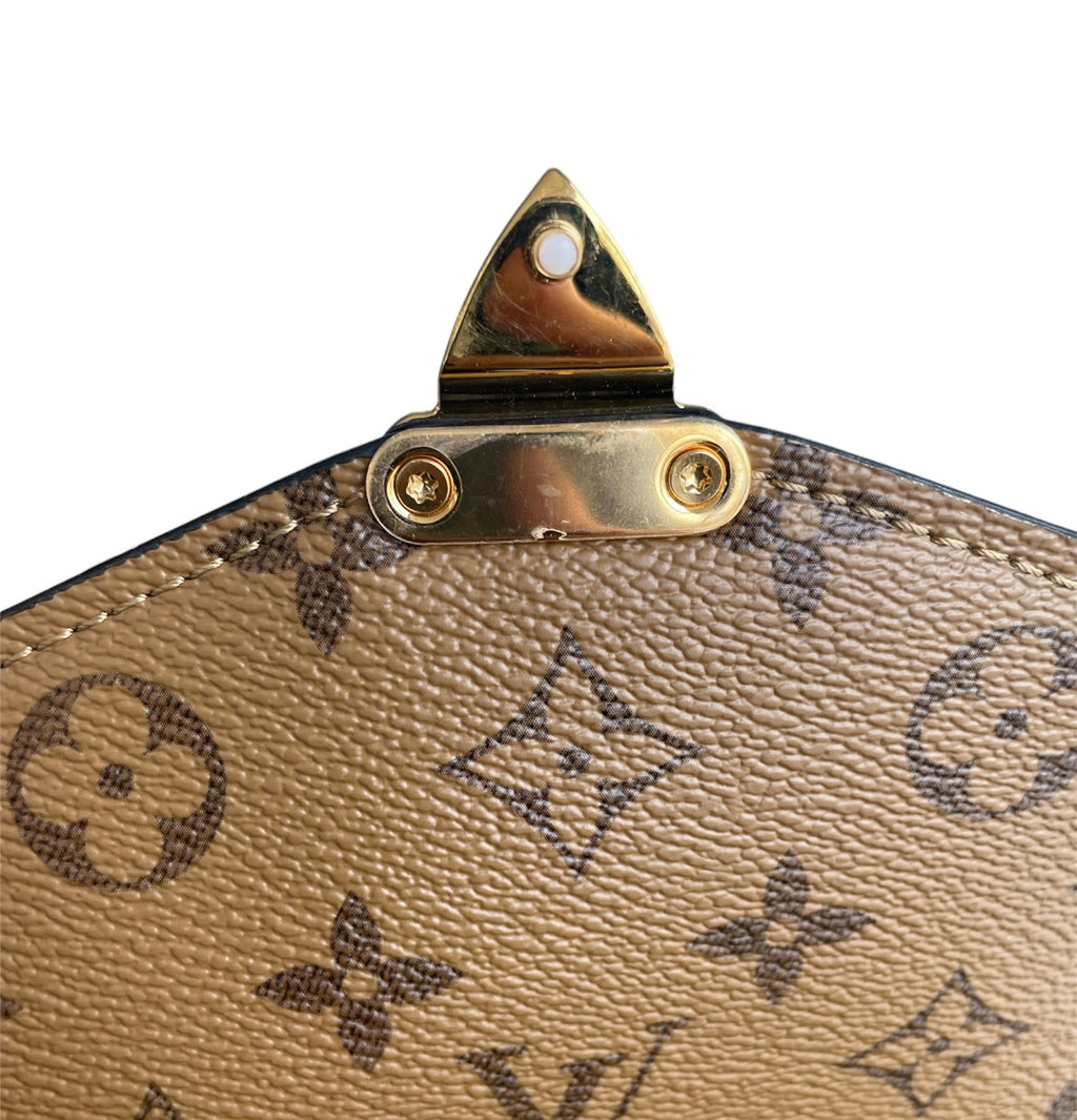 Louis Vuitton Reverse Monogram Metis Bag