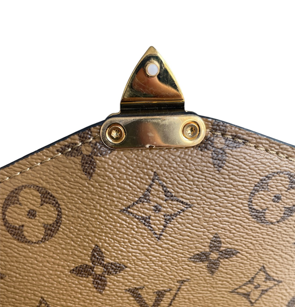 Louis Vuitton Reverse Monogram Metis Bag