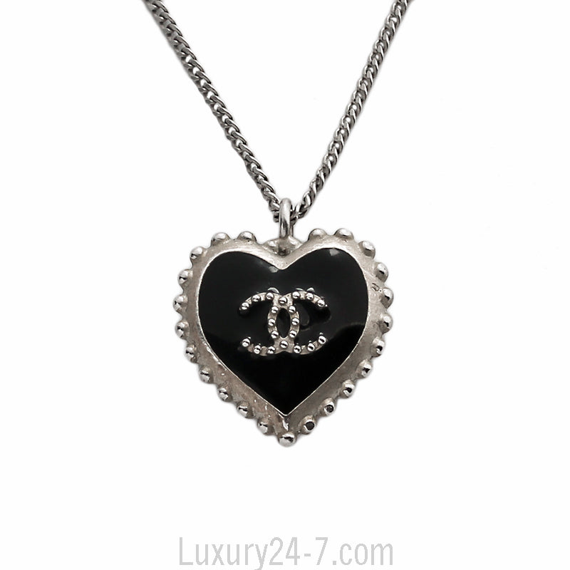 Chanel Silver Toned CC Heart Pendant Necklace