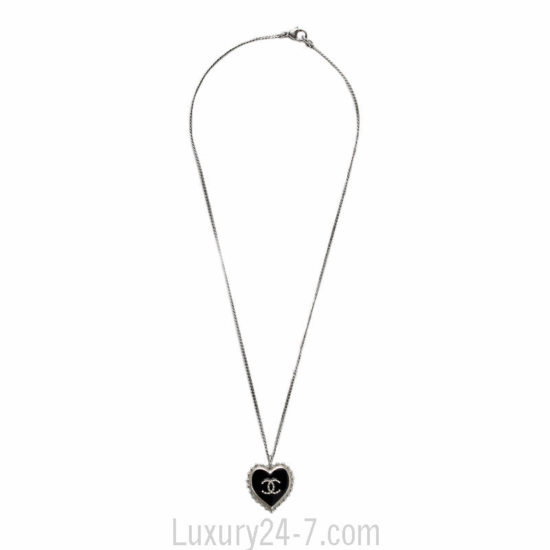 Chanel Silver Toned CC Heart Pendant Necklace